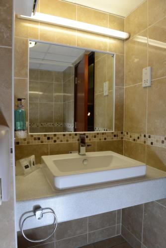 Kylpyhuone majoituspaikassa Best Western Wakefield Hotel St Pierre