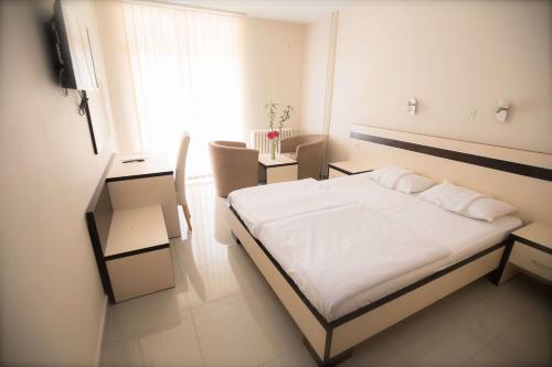 Una cama o camas en una habitación de Hotel Zelengora
