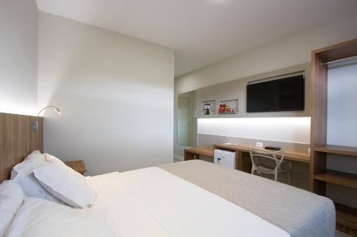 Katil atau katil-katil dalam bilik di Le CanarD Joinville
