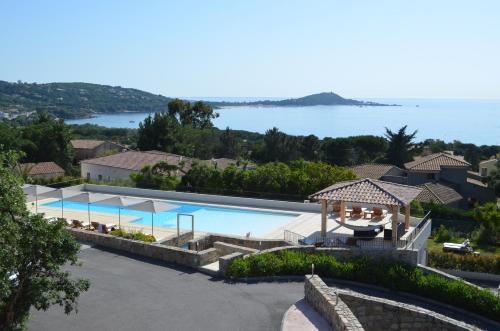 an aerial view of a resort with a swimming pool at Résidence Kallisté Porticcio in Porticcio