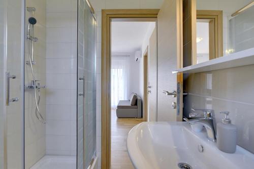 Koupelna v ubytování Apartments Kralj