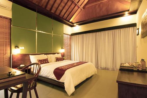 Letto o letti in una camera di Samata Village Gili Air
