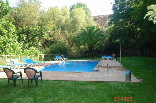 Swimming pool sa o malapit sa Alojamiento Rural Molino Del Puente
