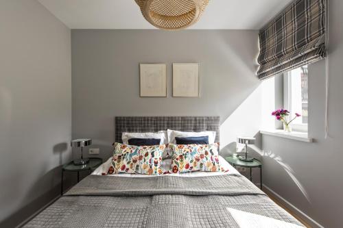 Katil atau katil-katil dalam bilik di Close to nature - Nida Apartments