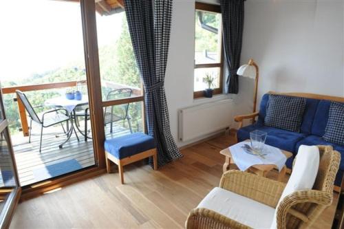 Ruang duduk di BELVEDERE - das BIO HOTEL Garni & SuiteHotel am Edersee ! Unser Geschenk für Sie, auch die GästeCard GrimmHeimat!