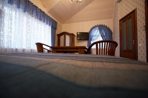 Кровать или кровати в номере Aquilonis