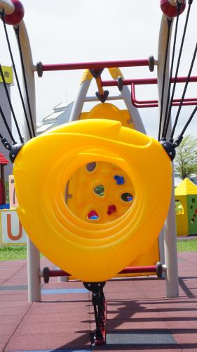 a yellow slide at a playground at Warm Home in Taitung City