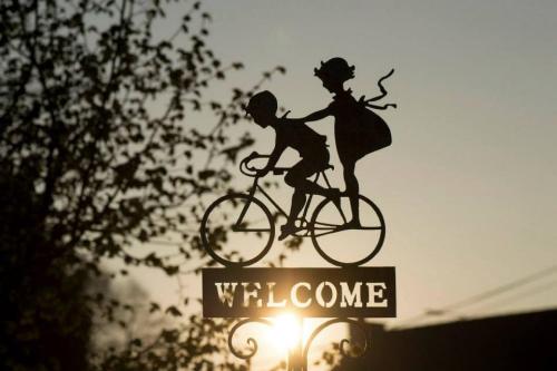 a statue of a woman riding a bike at GastHaus Hotel Bremen in Bremen