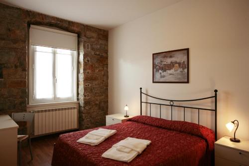 Ένα ή περισσότερα κρεβάτια σε δωμάτιο στο Residence Theresia- Tailor Made Stay