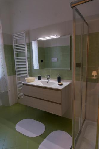 a bathroom with a sink and a mirror at Il Viale in Chieti