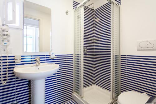 Koupelna v ubytování Corso Italia Suites