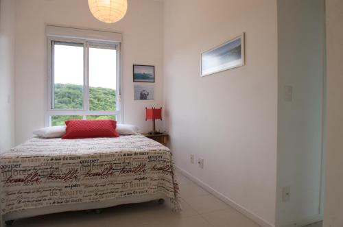 Ένα ή περισσότερα κρεβάτια σε δωμάτιο στο Sea Front, Front Native Forest