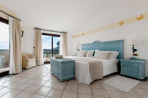 Кровать или кровати в номере Hotel Abi d'Oru