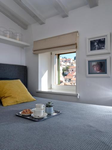 Ένα ή περισσότερα κρεβάτια σε δωμάτιο στο Luxury Apartment Bifora