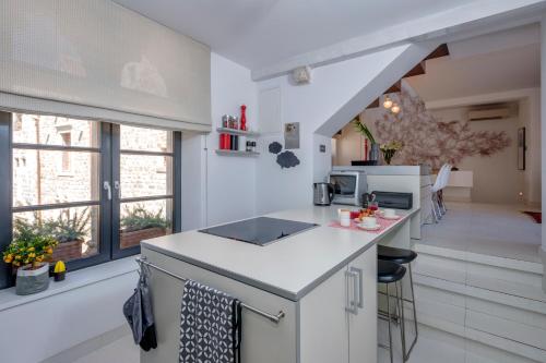Η κουζίνα ή μικρή κουζίνα στο Luxury Apartment Bifora