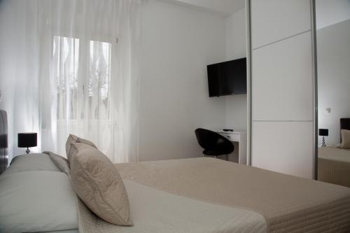 Voodi või voodid majutusasutuse Apartments Victoria toas