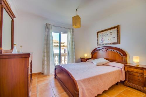 Ένα ή περισσότερα κρεβάτια σε δωμάτιο στο Villa Marcos Lago Esperanza