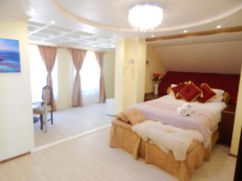 Postel nebo postele na pokoji v ubytování Hotel Boutique Castillo del Mar