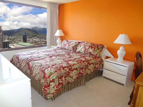 Waikiki Vacation 10 객실 침대