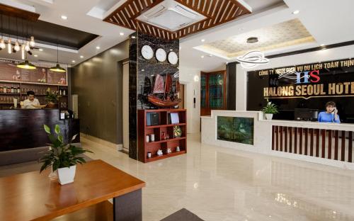 a restaurant lobby with a bar and a counter at Halong Seoul Hotel in Ha Long