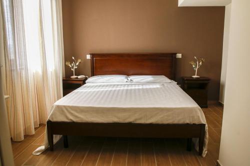 Кровать или кровати в номере Tenuta Cerreto