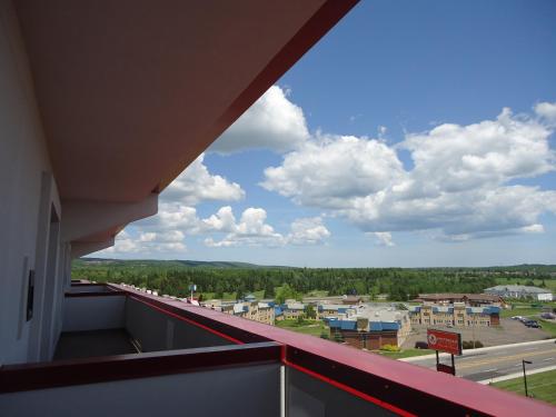 a view of a city from a balcony at Hotel Casino New Nouveau Brunswick in Moncton
