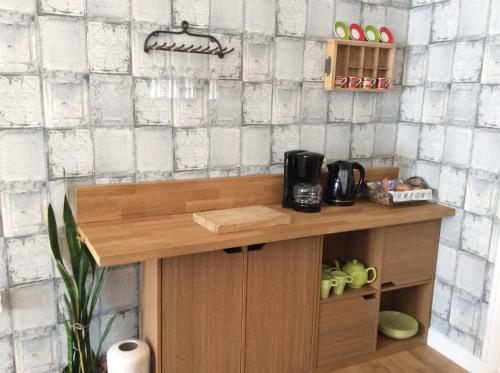 a kitchen with a counter with a coffee maker on it at Number 7 Gouarec in Gouarec
