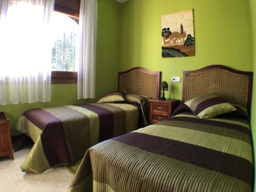 Krevet ili kreveti u jedinici u okviru objekta ARENDA Pino Alto Holiday Home Rioja
