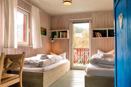 Ένα ή περισσότερα κρεβάτια σε δωμάτιο στο Ferienhaus Strandhaus