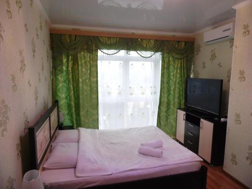 Кровать или кровати в номере Апартаменты «На Горького 87»