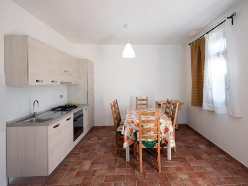 A kitchen or kitchenette at Agriturismo OlivoMare