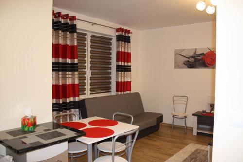 A seating area at Studio - apartament w Piszu na Mazurach