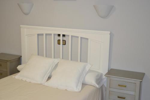 Postel nebo postele na pokoji v ubytování Hotel Balcón de Cazorla