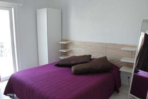 Postel nebo postele na pokoji v ubytování Hotel Marko