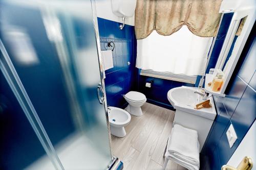 Koupelna v ubytování Hotel Ospite Inatteso