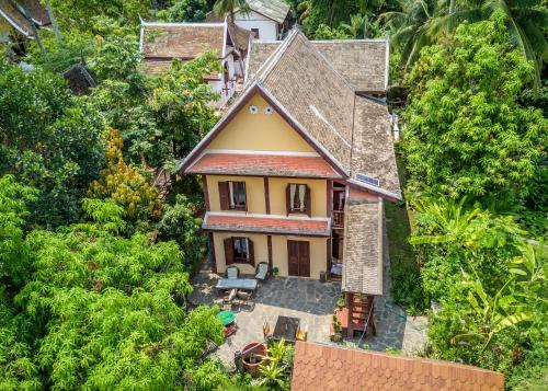 an aerial view of a house in the jungle at Villa Khoum Xieng Thong Boutique in Luang Prabang
