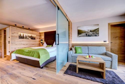 Ένα ή περισσότερα κρεβάτια σε δωμάτιο στο Hotel Saltauserhof