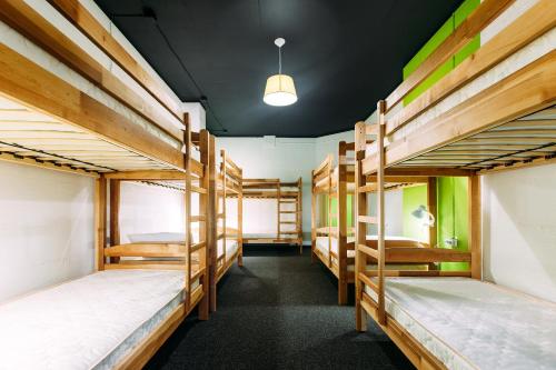 Кровать или кровати в номере Happy Hostel Kiev
