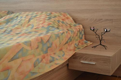 Łóżko lub łóżka w pokoju w obiekcie Apartment Gashi