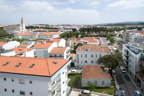 an aerial view of a city with buildings at Hotel Santa Isabel in Fátima