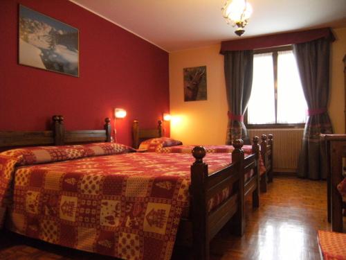 Postel nebo postele na pokoji v ubytování Albergo Thurwieser