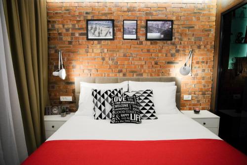 SL Industry Hotelにあるベッド
