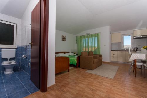 Kuchyňa alebo kuchynka v ubytovaní Apartments Fumija