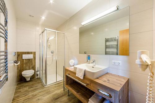 Koupelna v ubytování Apart-Hotel Bergkönig