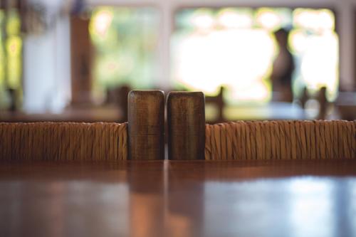a close up of a wooden rail on a table at Carü Leufu in Valle Grande