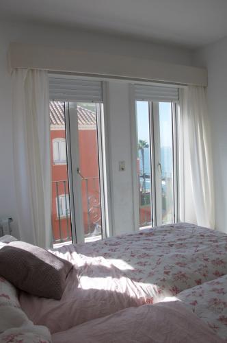 Katil atau katil-katil dalam bilik di Ático Playa Muralla
