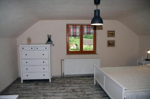 Postel nebo postele na pokoji v ubytování Apartma Obrh