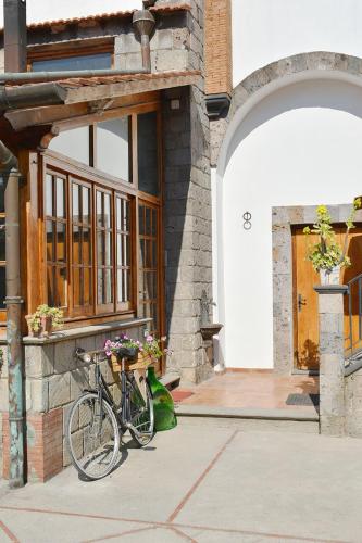 a bike parked in front of a building at Casa Lucia in Sorrento