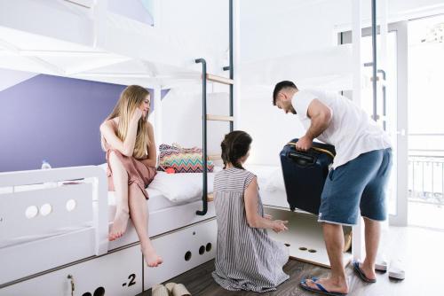 a group of people in a bunk bed at Cocoon City Hostel in Chania