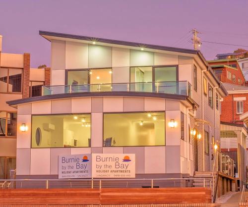 a building with a bumpyadyady by the bay at Burnie by the Bay Apartments in Burnie